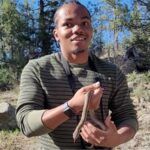 Portrait of John Suggs, NAU student remembered in memoriam.