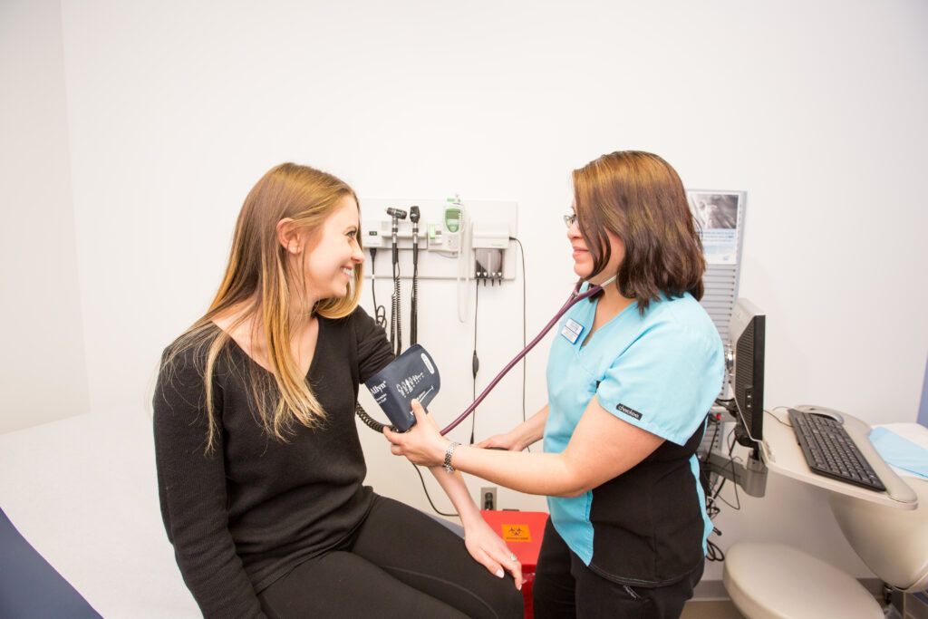 A student get's their vital's checked at N A U's Health and Learning Center.