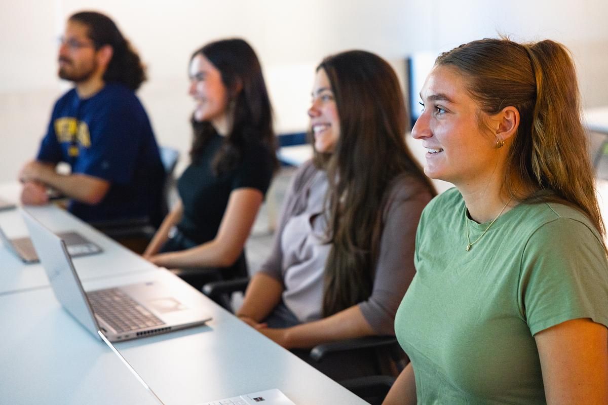 Future NAU grad students listen intently during an informational session.