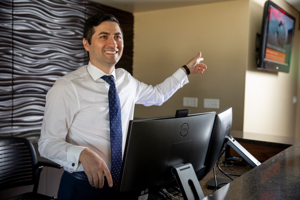 An NAU professor teaches about hotel management.